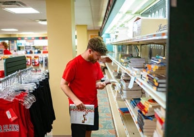 Student shopping at bookstore