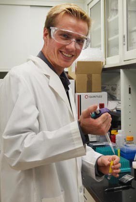 Chemistry student in lab coat