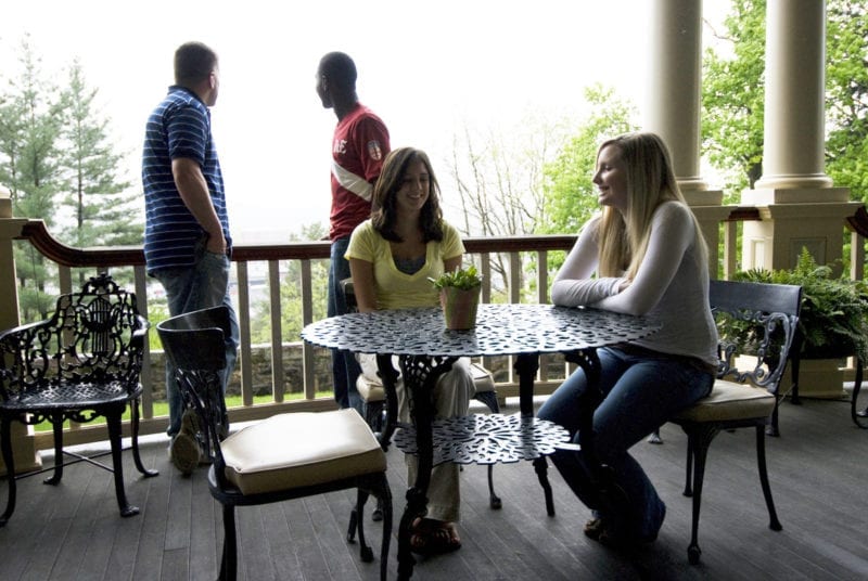 Students hanging out at the veranda