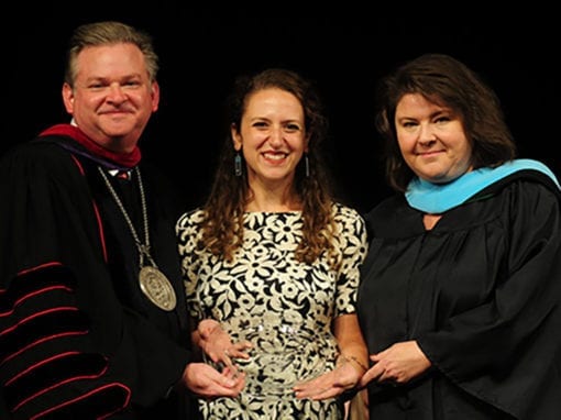 President with staff and student