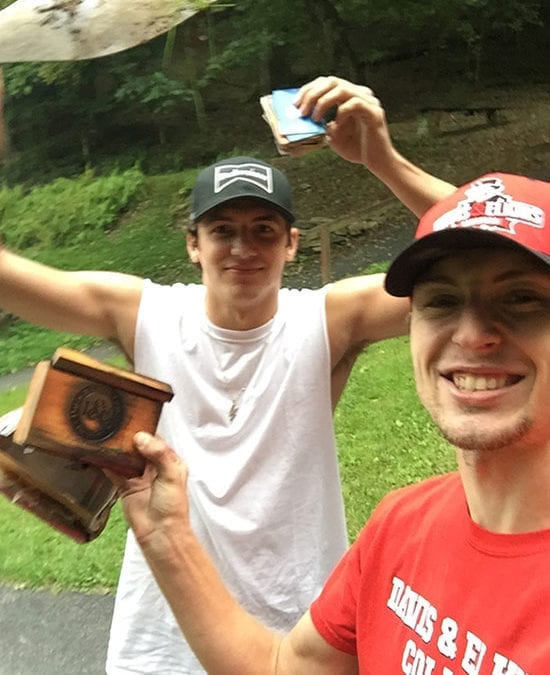 Students smiling during a campus treasure hunt