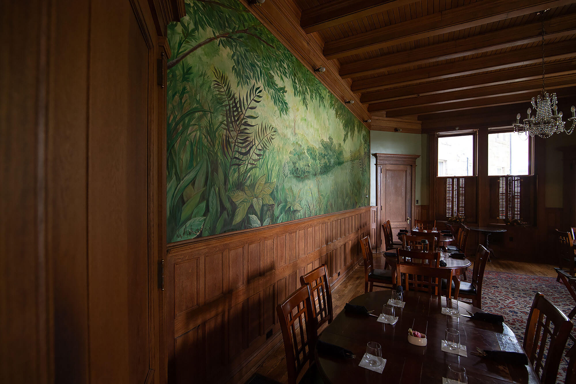 Graceland decorative wall with a jungle scene painted on it