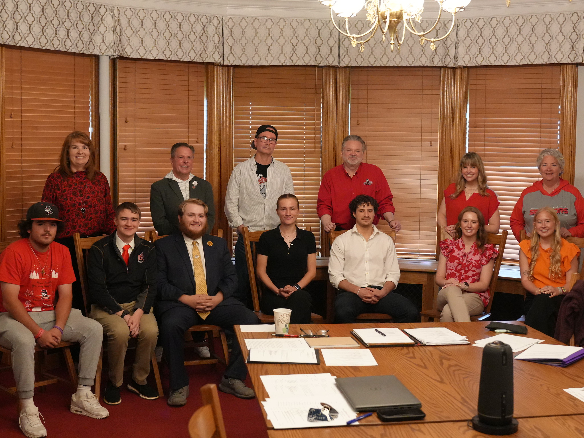 Cabinet Flip Day Participants gather in the Portico Room