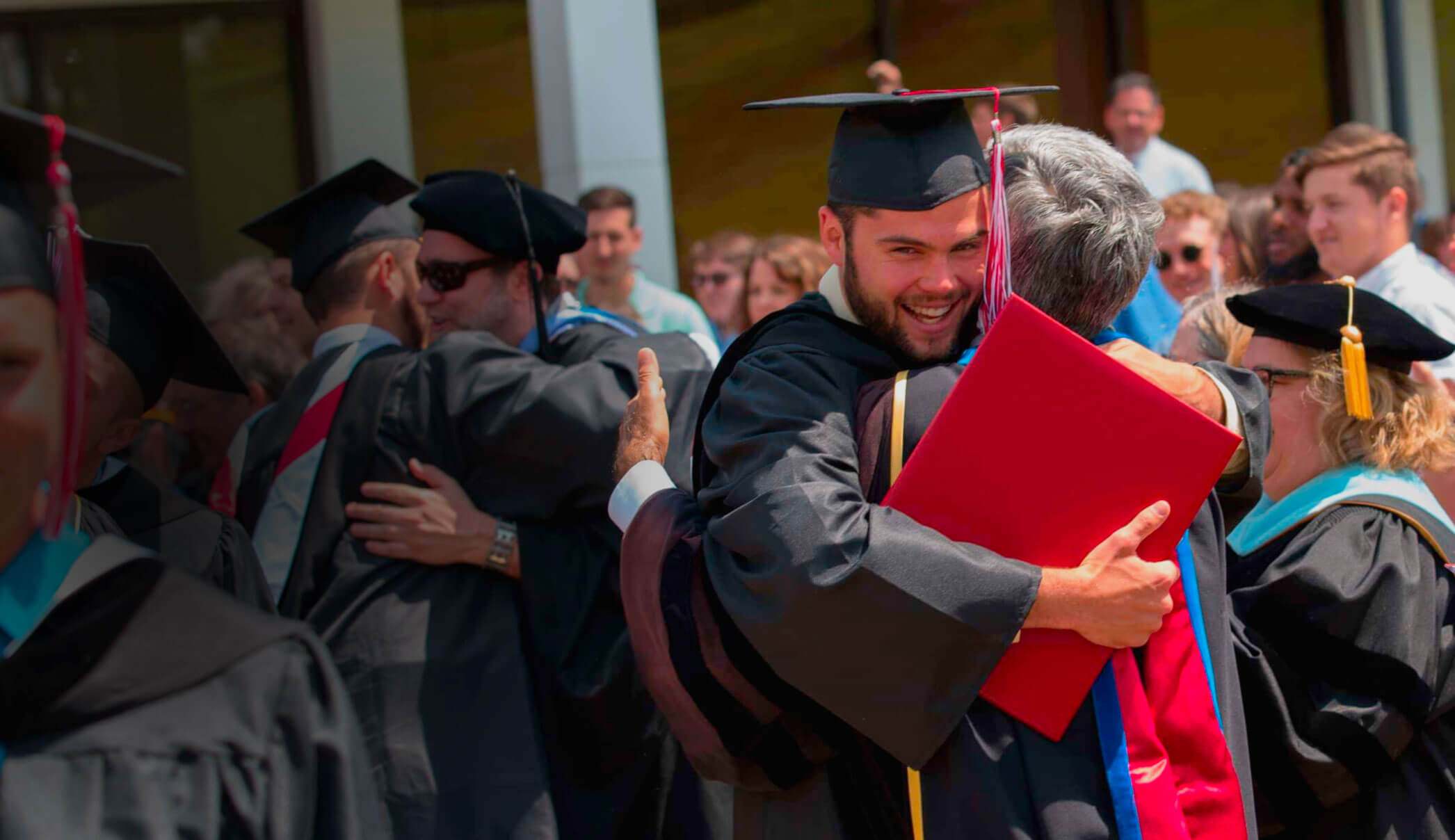 Hugging it out at graduation – and deservedly so!