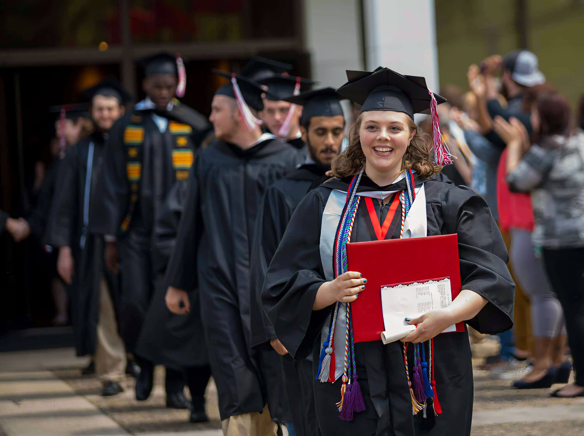 New graduate, pleased with her degree