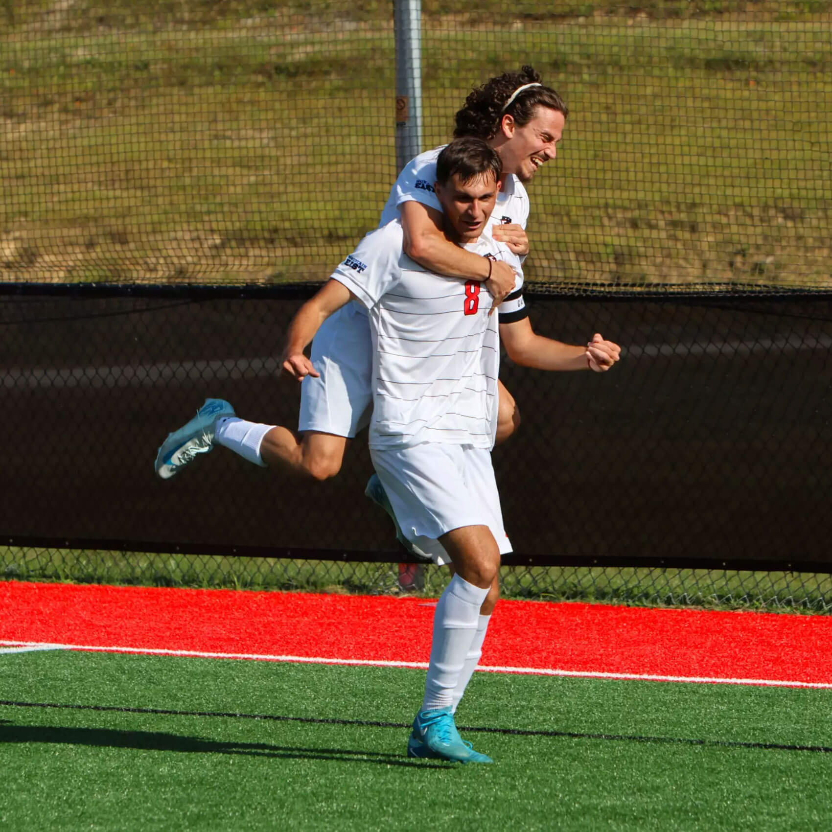D&E Soccer players celebrating a goal